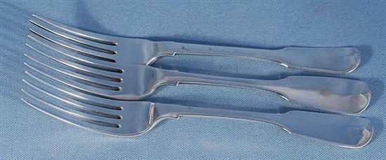 A matched set of three George IV silver fiddle pattern table forks, Weight 9oz/285 grms